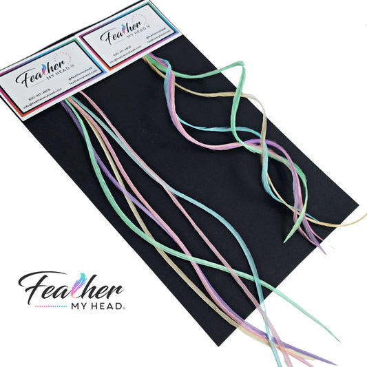 Hair feathers in pretty pastel colors of blue, pink, green, yellow