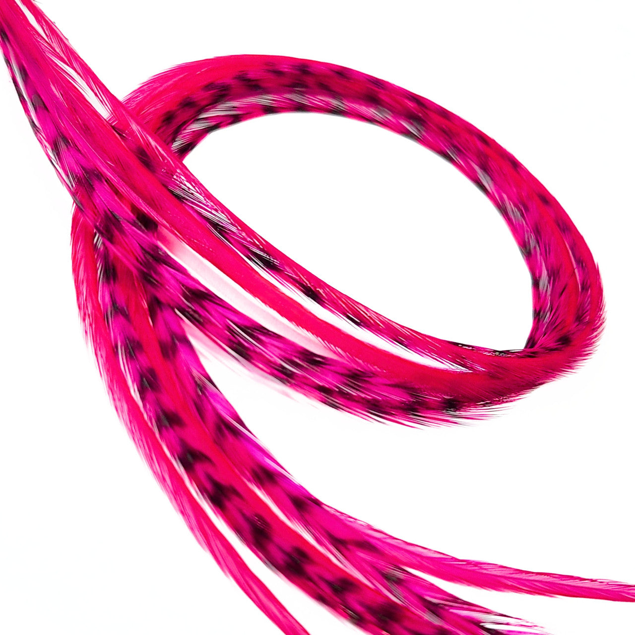Inspired by the fiery hues of a desert sunset and the vibrant energy of blooming wildflowers, our Fuchsia Pink Hair Feathers exude confidence and passion. This electrifying shade evokes feelings of bold self-expression, blending the intensity of magenta with the softness of a pink glow. It's playful yet fierce, like a streak of summer lightning or the petals of a tropical orchid.