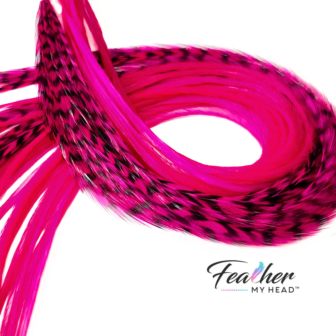 Inspired by the fiery hues of a desert sunset and the vibrant energy of blooming wildflowers, our Fuchsia Pink Hair Feathers exude confidence and passion. This electrifying shade evokes feelings of bold self-expression, blending the intensity of magenta with the softness of a pink glow. It's playful yet fierce, like a streak of summer lightning or the petals of a tropical orchid.