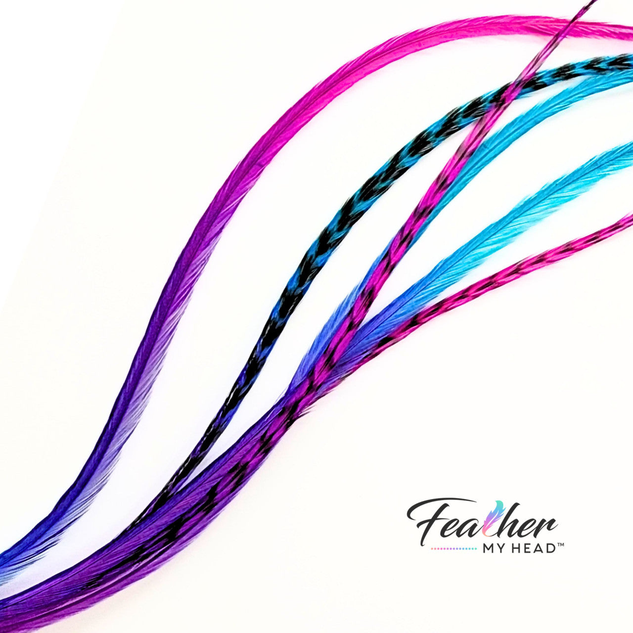 Let your hair catch the spirit of summers carefree days and warm summer nights with our hand-dyed hair feathers.
Each feather extension is unique blending shades of pink, purple, blue, and turquoise for mesmerizing rainbow tie-dye effect