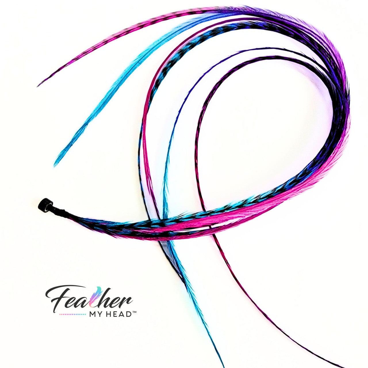 Let your hair catch the spirit of summers carefree days and warm summer nights with our hand-dyed hair feathers.
Each feather extension is unique blending shades of pink, purple, blue, and turquoise for mesmerizing rainbow tie-dye effect