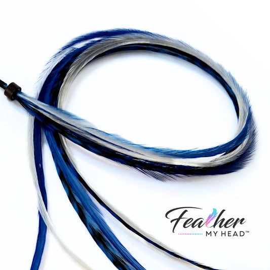 Check out our "Let It Snow Blue and White" hair feathers from the Christmas Collection! They're the perfect way to add a festive touch to your holiday look. Whether you're going for a winter wonderland vibe or just want to add a cool accent to your style, these blue and white feathers are the ideal way to let it snow!