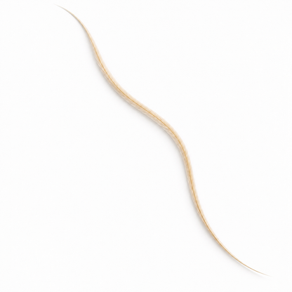 One extra-long solid cream rooster feather hair extension on a white background.