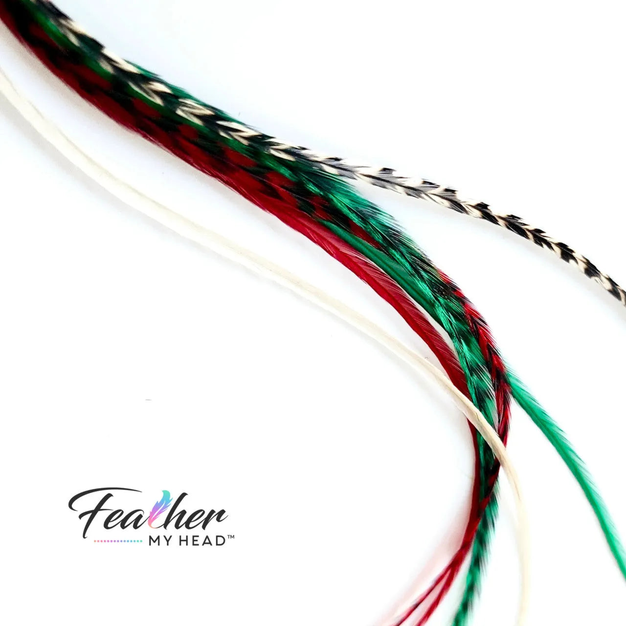 Dive into the holiday fun with our Elfin Around Christmas Collection of feather extensions! This 6-piece pack of hair feather extensions brings a playful touch to your look. With vibrant red, green, classic white, and natural black and white grizzly hair feathers, Elfin Around adds a festive twist to your hair. Get ready to embrace the holiday spirit and Elf Around in style!