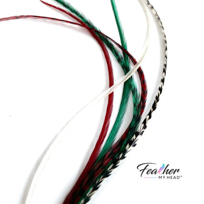 Dive into the holiday fun with our Elfin Around Christmas Collection of feather extensions! This 6-piece pack of hair feather extensions brings a playful touch to your look. With vibrant red, green, classic white, and natural black and white grizzly hair feathers, Elfin Around adds a festive twist to your hair. Get ready to embrace the holiday spirit and Elf Around in style!