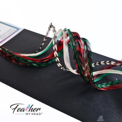 Dive into the holiday fun with our Elfin Around Christmas Collection of feather extensions! This 6-piece pack of hair feather extensions brings a playful touch to your look. With vibrant red, green, classic white, and natural black and white grizzly hair feathers, Elfin Around adds a festive twist to your hair. Get ready to embrace the holiday spirit and Elf Around in style!