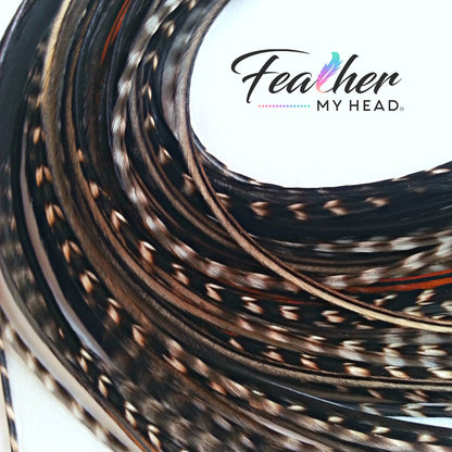 Black Variant Hair Feathers are natural feathers that will widely vary in color and markings on each feather. No two feathers will be the same. This color is used often in our natural mix collections. Color pairs well with other natural feathers for a soft natural look. 