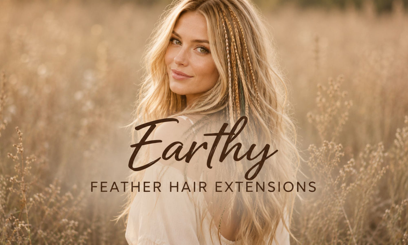 Hero banner for earthy feather hair extensions featuring a blonde woman wearing long feather hair extensions in natural brown, beige, gold, and muted green tones outdoors