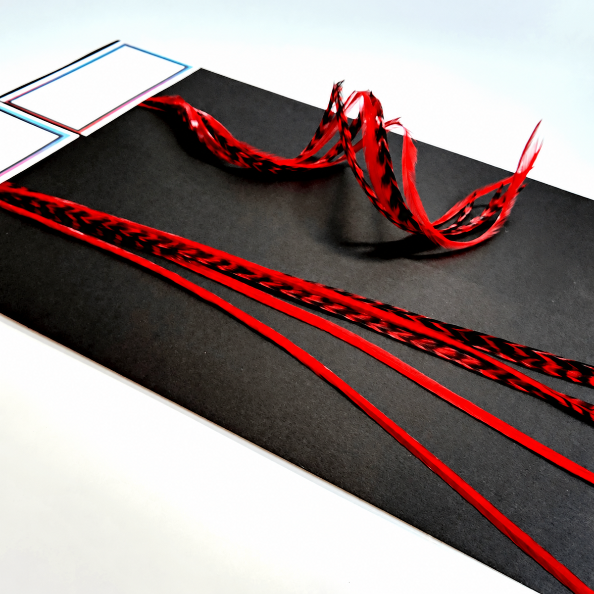 Deep Red Hair Feather shown in the product photograph