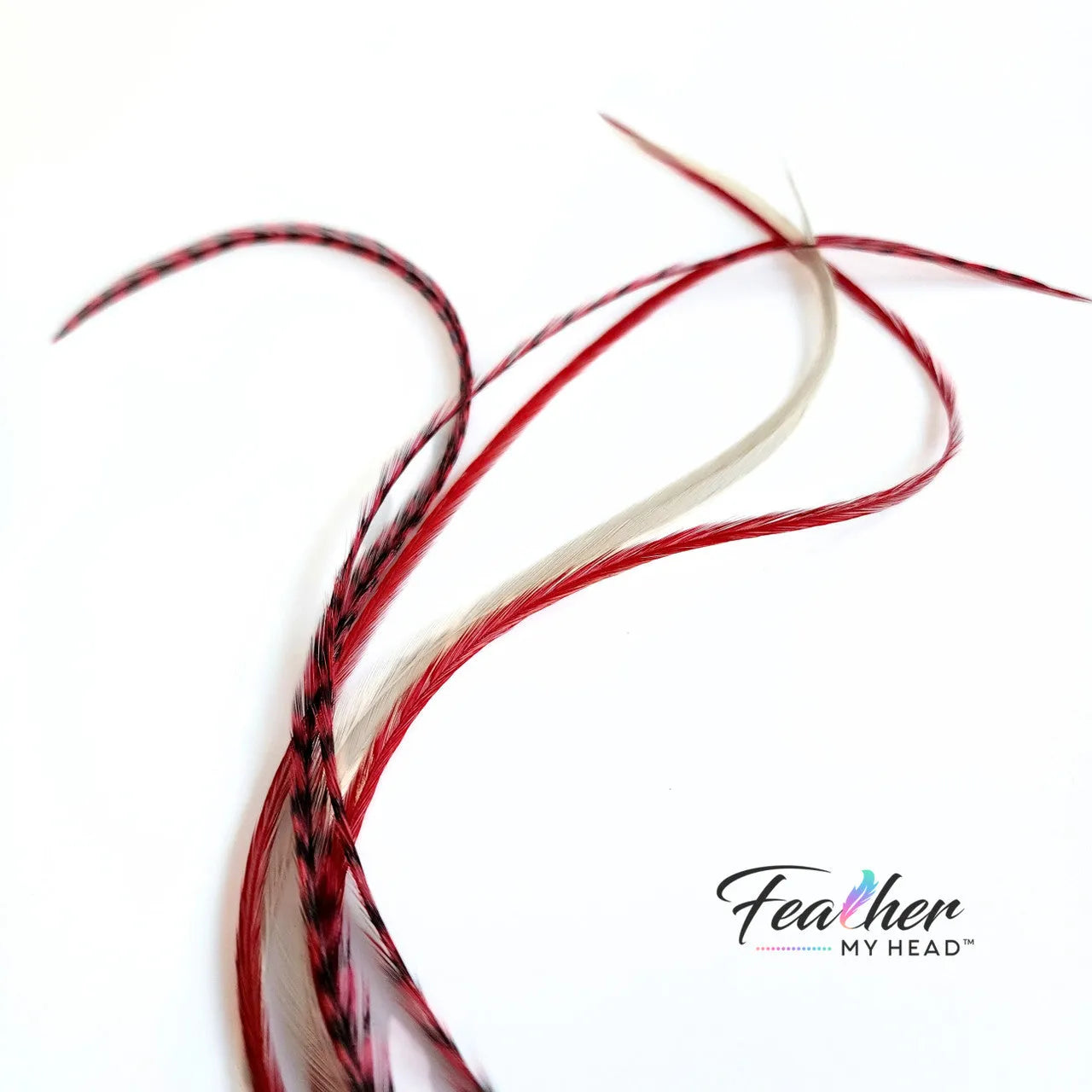 Unleash the magic of the season with our Naughty or Nice hair feather Collection! Dive into a world where crimson red and snow-white feathers come together. Dare to be a little naughty, embrace the nice – let the feathers tell your festive story.