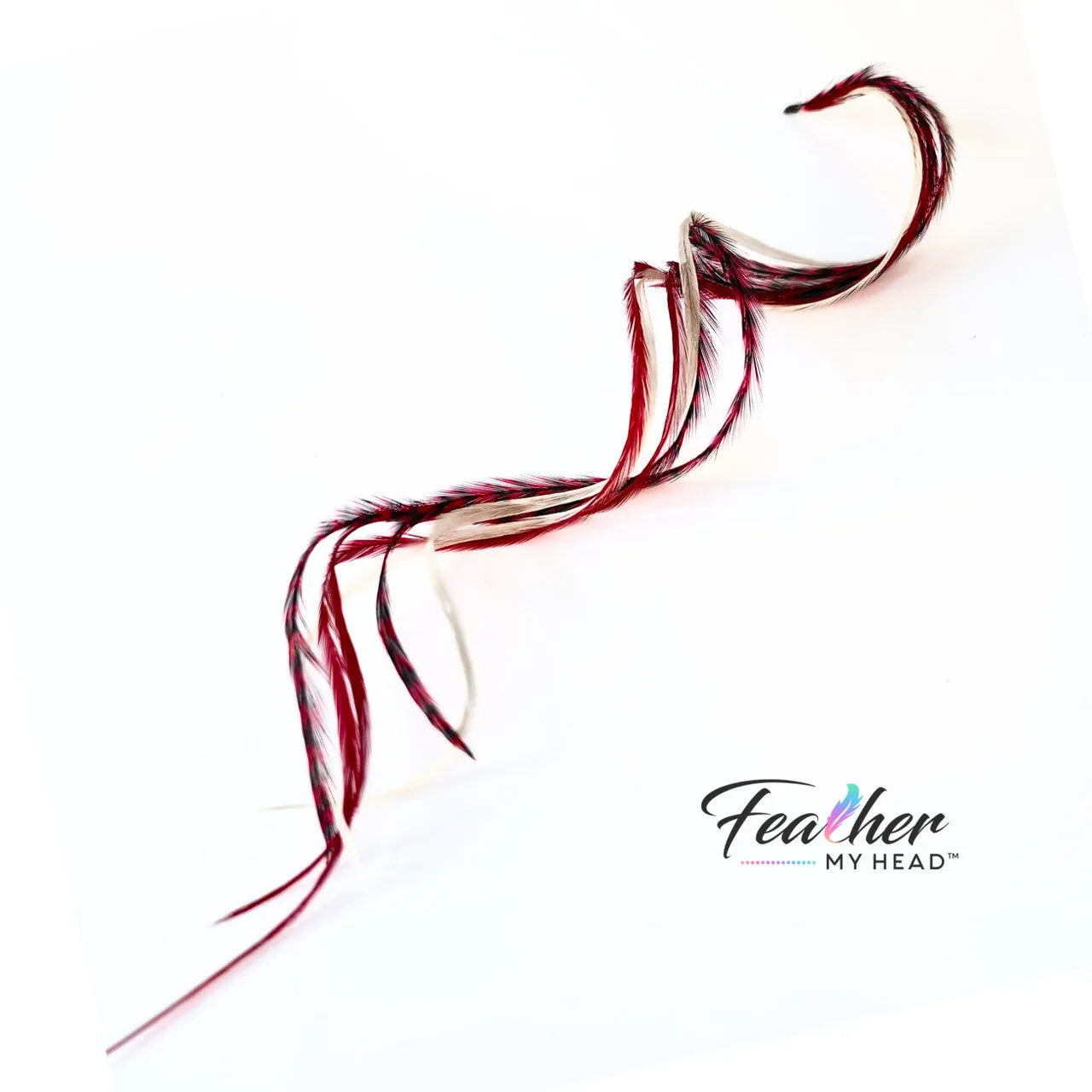 Unleash the magic of the season with our Naughty or Nice hair feather Collection! Dive into a world where crimson red and snow-white feathers come together. Dare to be a little naughty, embrace the nice – let the feathers tell your festive story.