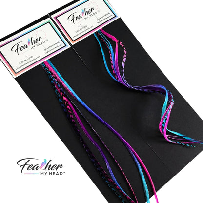 Let your hair catch the spirit of summers carefree days and warm summer nights with our hand-dyed hair feathers.

Each feather extension is unique blending shades of pink, purple, blue, and turquoise for mesmerizing rainbow tie-dye effect