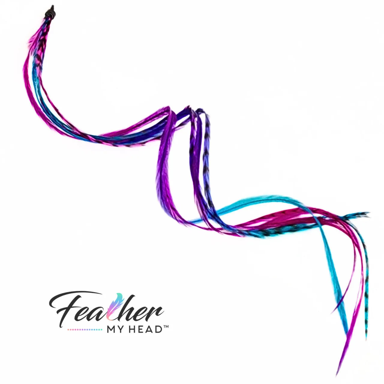 Let your hair catch the spirit of summers carefree days and warm summer nights with our hand-dyed hair feathers.

Each feather extension is unique blending shades of pink, purple, blue, and turquoise for mesmerizing rainbow tie-dye effect