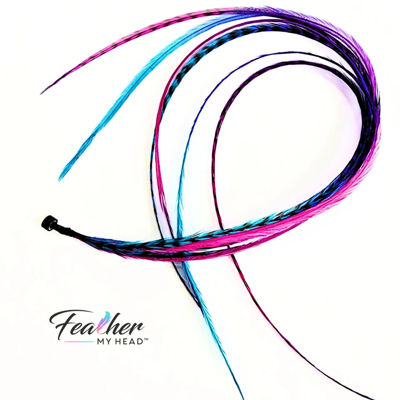 Let your hair catch the spirit of summers carefree days and warm summer nights with our hand-dyed hair feathers.

Each feather extension is unique blending shades of pink, purple, blue, and turquoise for mesmerizing rainbow tie-dye effect