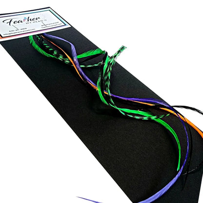 Feather Hair Extension Kit by Feather My Head. Mix of  orange, purple, black feathers and green.  Real hair feathers in long lengths. Halloween costume accessory