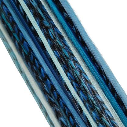 Close-up detail of Sea Glass feather hair extensions with blue, aqua, and grizzly striped feathers
