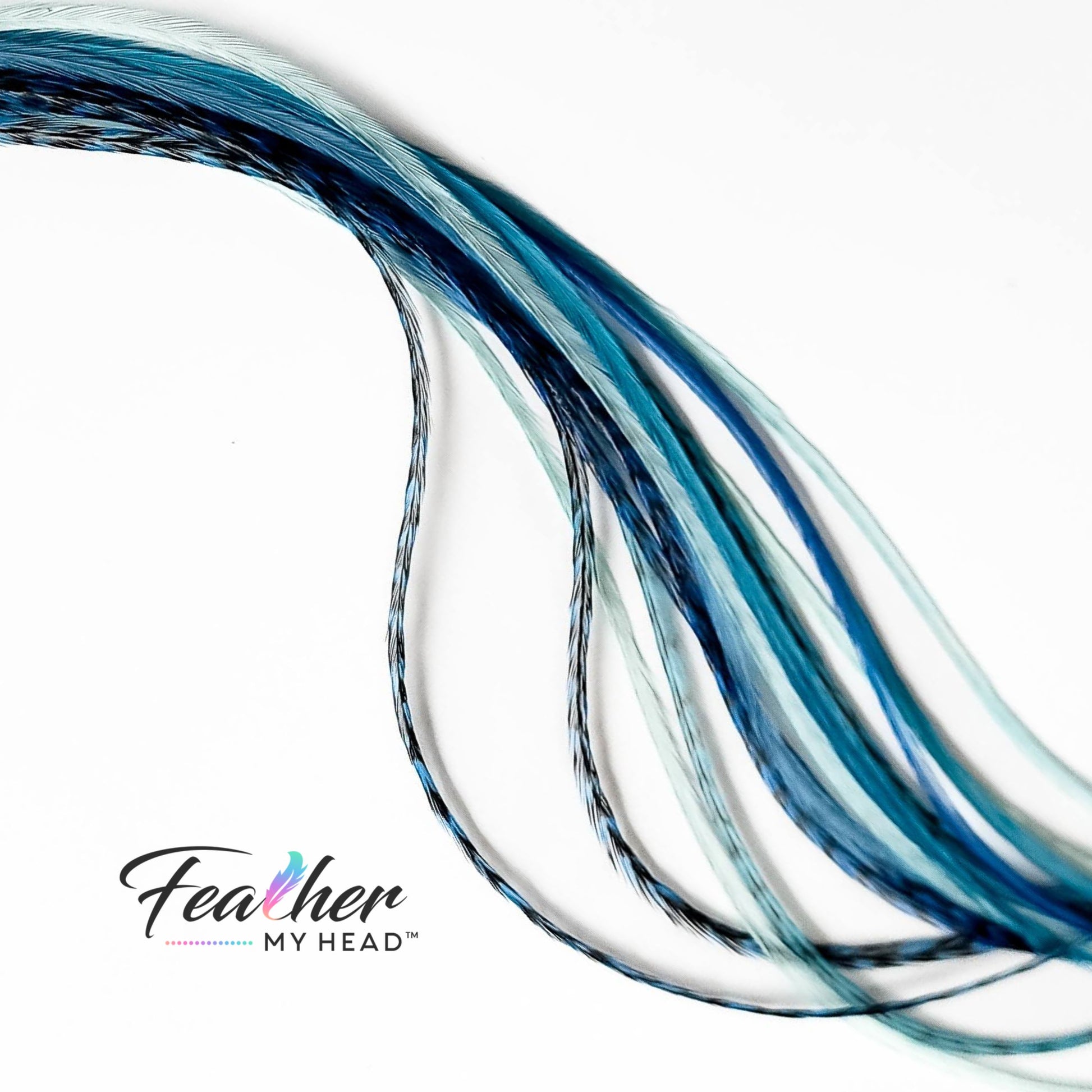 Blue and aqua Sea Glass feather hair extensions arranged to show long length and natural movement