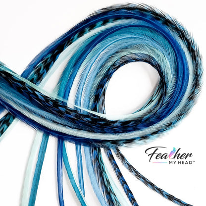 Coiled Sea Glass feather hair extensions showing soft blue and aqua tones with natural movement