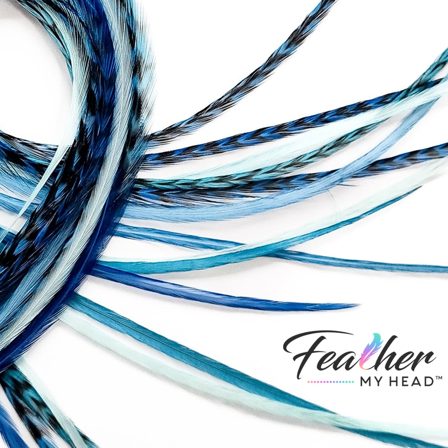 Close-up of long Sea Glass feather hair extensions in blue, aqua, and seafoam shades