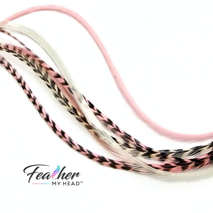Our Strawberry Champagne Hair Feathers feature soft pink and creamy white hues, inspired by the sweetness of fresh strawberries and the elegance of champagne. These long, flowing feathers add a dreamy, romantic touch with a hint of playful charm.