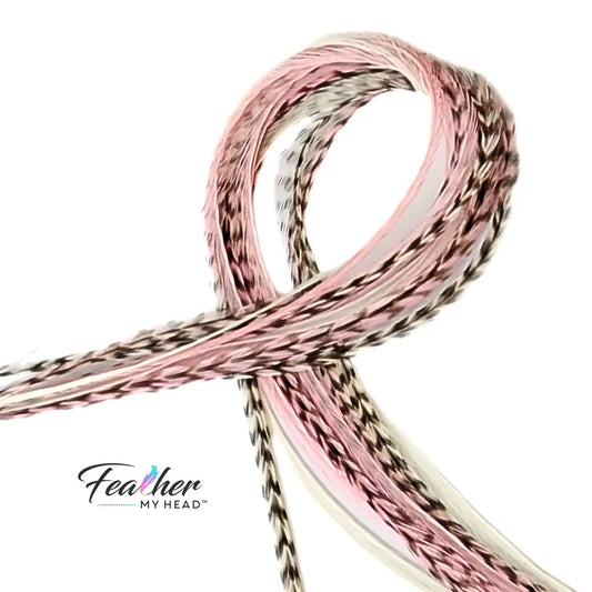 Our Strawberry Champagne Hair Feathers feature soft pink and creamy white hues, inspired by the sweetness of fresh strawberries and the elegance of champagne. These long, flowing feathers add a dreamy, romantic touch with a hint of playful charm.