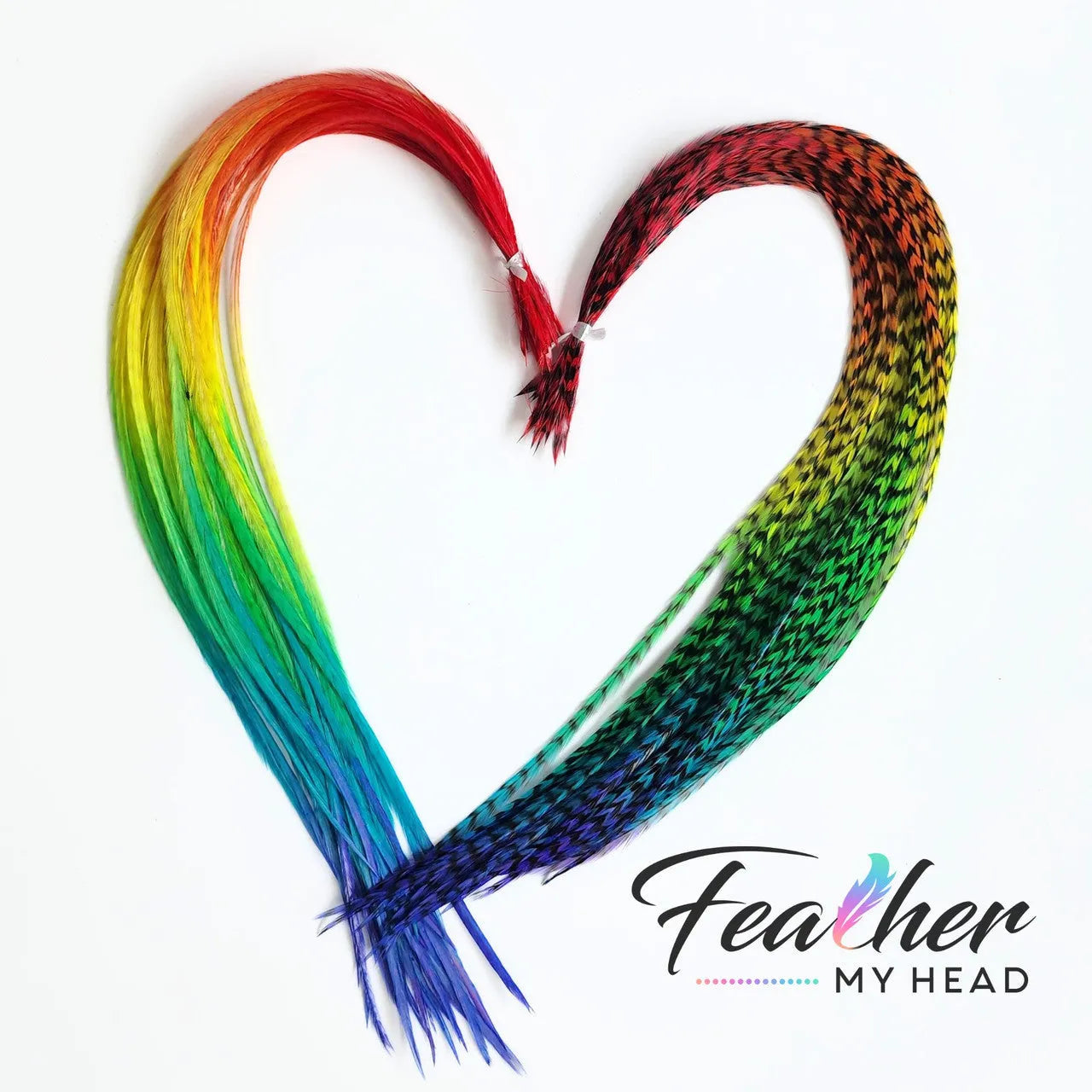 Hair Feather Extensions in rainbow colors of red, orange, yellow, green, blue, and purple. Short and Long Hair Feathers available. Hair Feathers by Feather My Head