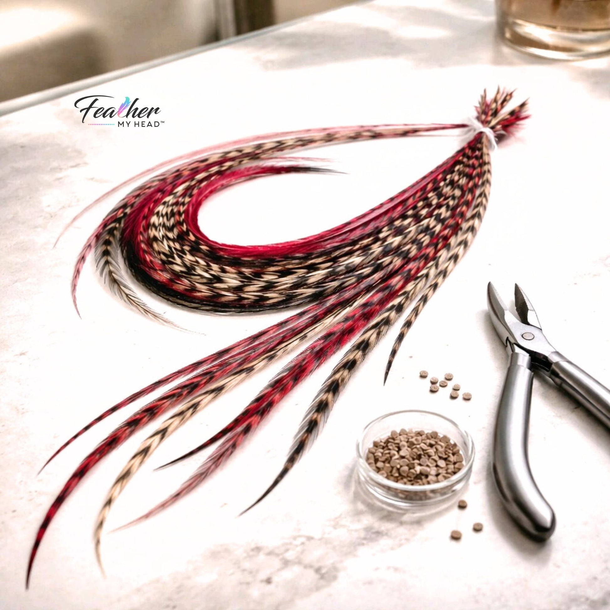 Sedona feather hair extensions with earthy red and brown feather colors.